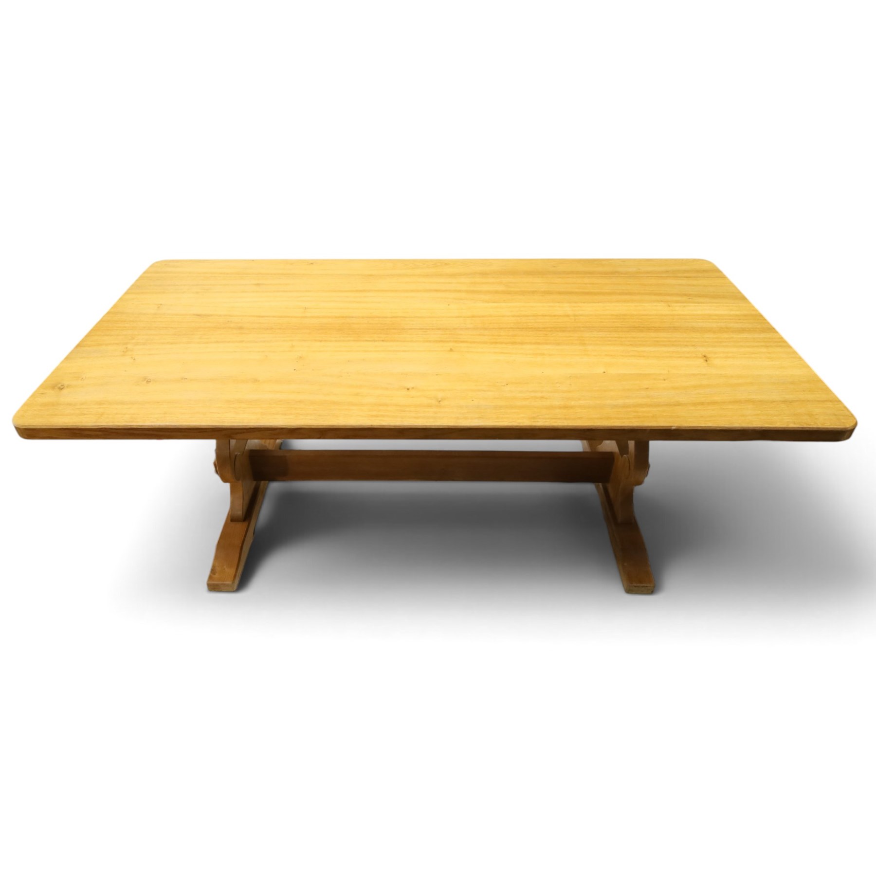 Acorn Industries - oak dining table, rectangular top with rounded corners and chamfered edge, raised on twin lyre-shaped supports united by pegged stretched on sledge feet, carved with acorn signature to stretcher, by Alan Grainger, Brandsby