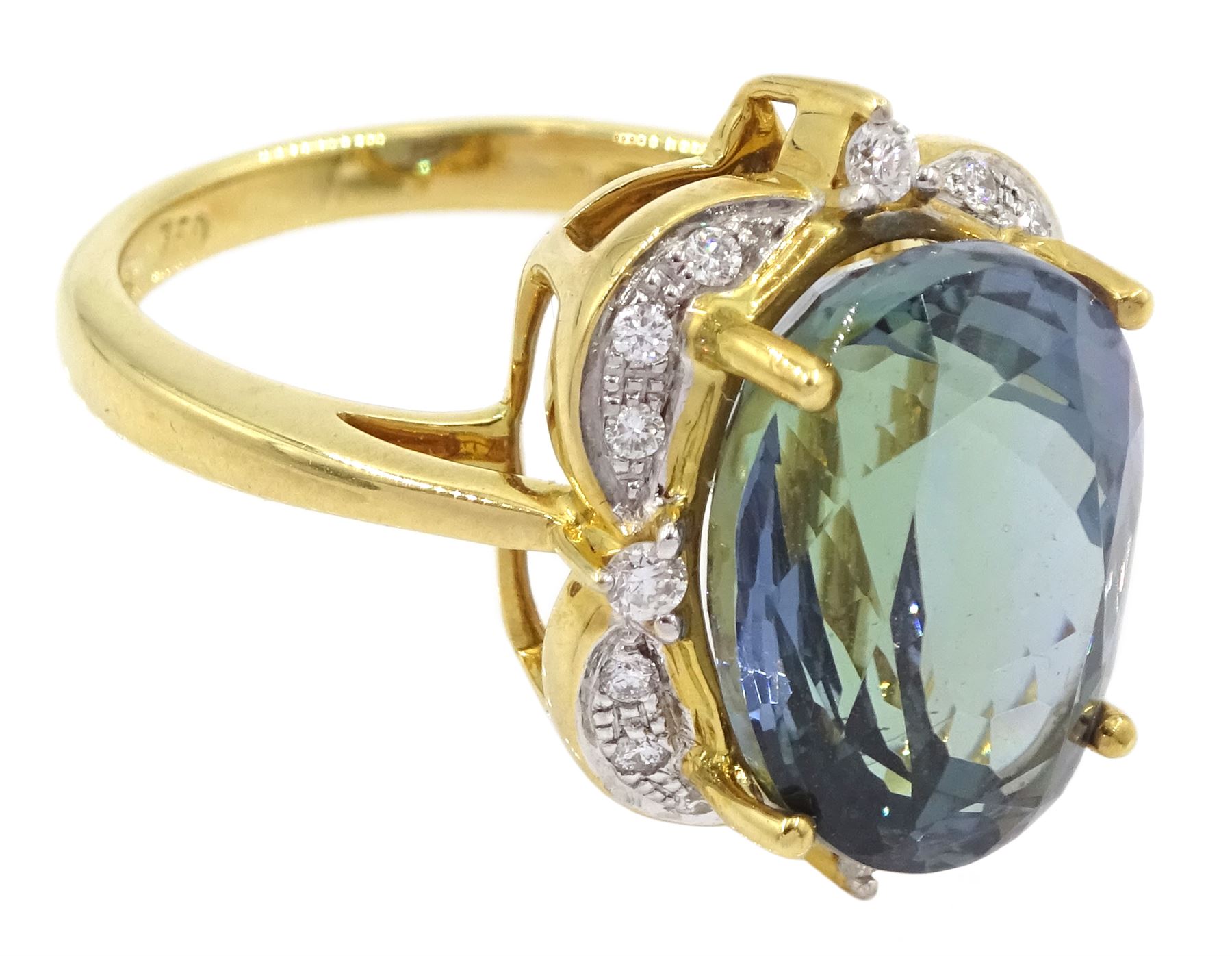 18ct gold oval cut fancy colour tanzanite and round brilliant cut diamond cluster ring, hallmarked, tanzanite approx 9.00 carat