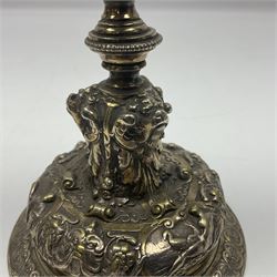 Pair of Victorian Elkington Mason & Co silver plated candlesticks, decorated in relief with ram masks and figures, H14cm