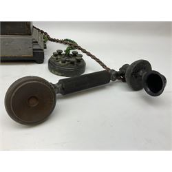 Early 20th century Danish desk telephone inscribed The Ericsson Bell Telephone Co. Glasgow to one side and Aktieselskabet Electrisk Bureau Kristiansand to the other, ebonised wooden top with handset on brass cradle. black japanned tin centre section bearing Hull Corporation Telephones Department crest, side cranking handle and ebonised wooden base H30cm  