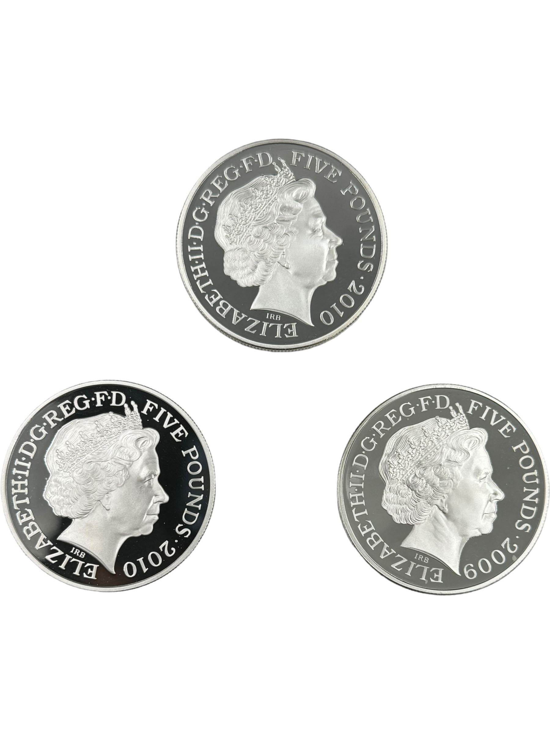 The Royal Mint United Kingdom 'A Celebration of Britain' silver proof coin set, comprising eighteen five pound coins relating to the London 2012 Olympic Games, housed in display case with certificates