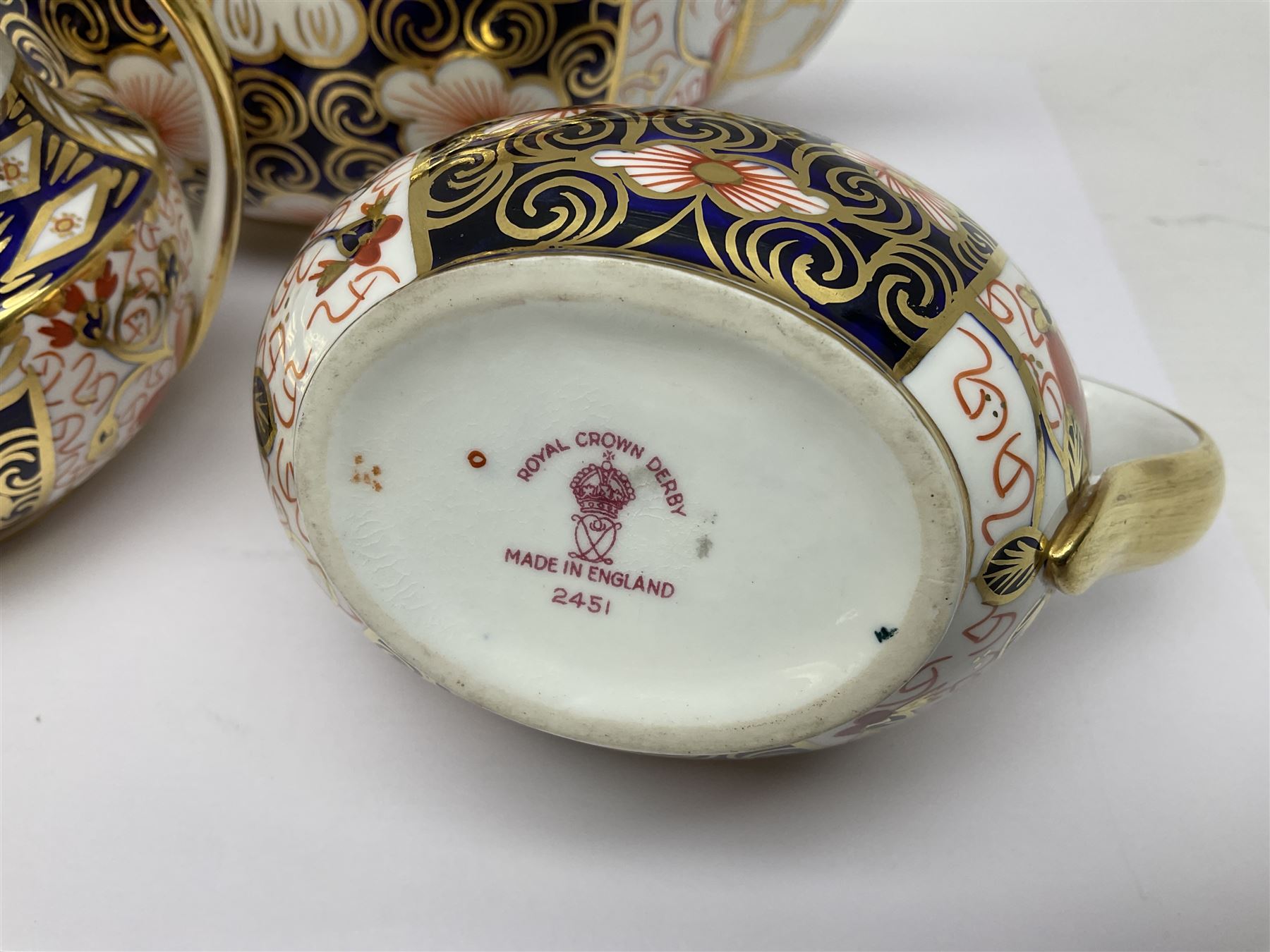 Royal Crown Derby 2451 Imari pattern three piece tea set, comprising teapot, covered sucrier and milk jug, teapot H12cm 