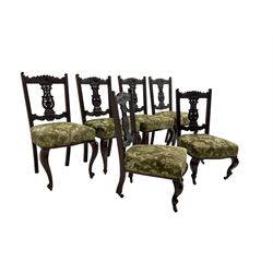 Set six (4+2) late 19th century mahogany dining chairs, pierced and carved splat back with cartouche and foliate design, scrolled cresting rail, sprung seat upholstered in green patterned fabric, raised on cabriole supports, the two shorter chairs with brass and ceramic castors