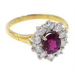  18ct gold oval ruby and round brilliant cut diamond cluster ring, hallmarked, ruby  1.07 carat  