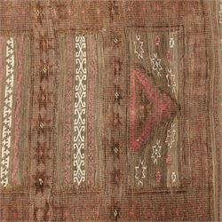Tekke Turkman rug, madder red field decorated with repeating rows of octagonal guls, framed by multiple geometric borders, 86x133cm and an Anatolian flatweave kilim, 95x140cm, (2)