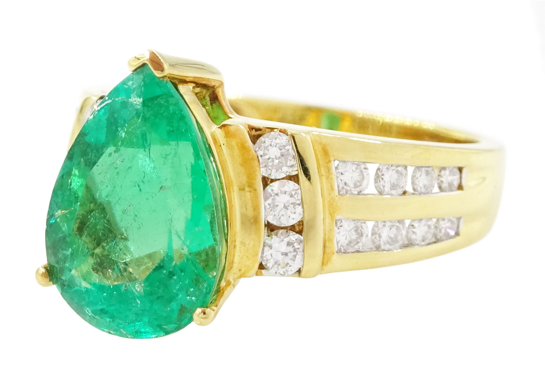 18ct gold Colombian emerald and diamond ring by Iliana, single pear cut emerald of approx 3.25 carat, with three round brilliant cut diamonds set either side and diamond set shoulders, hallmarked, total diamond weight 0.53 carat