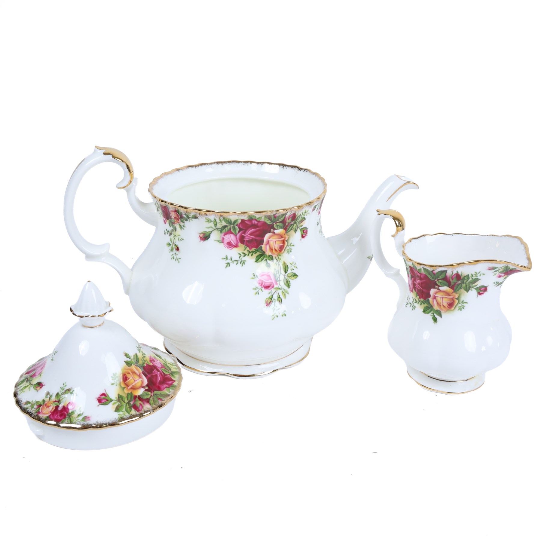Royal Albert Old Country Roses part tea and dinner service, including teapot, milk jug, six tea cups and saucers, six side plates and six dinner plates