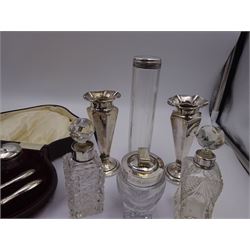 Pair of silver trumpet vases with fluted rims, together with four silver mounted glass scent bottles/jars and a silver mounted five piece manicure set, in fitted case, all hallmarked 