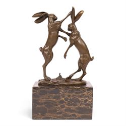 After Mario Nick - two hares boxing, bronze figure group, signed Nick and bearing foundry mark, upon rectangular plinth, H24cm