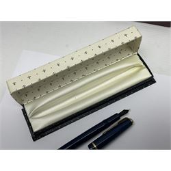 Three fountain pens, to include Conway Stewart 'Dinkie 550' and 'Conway 57' and a Parker 'Slimfold', all with 14ct gold nibs, together two roller ball pens, including a Parker example and a Swarovski Crystal paperweight