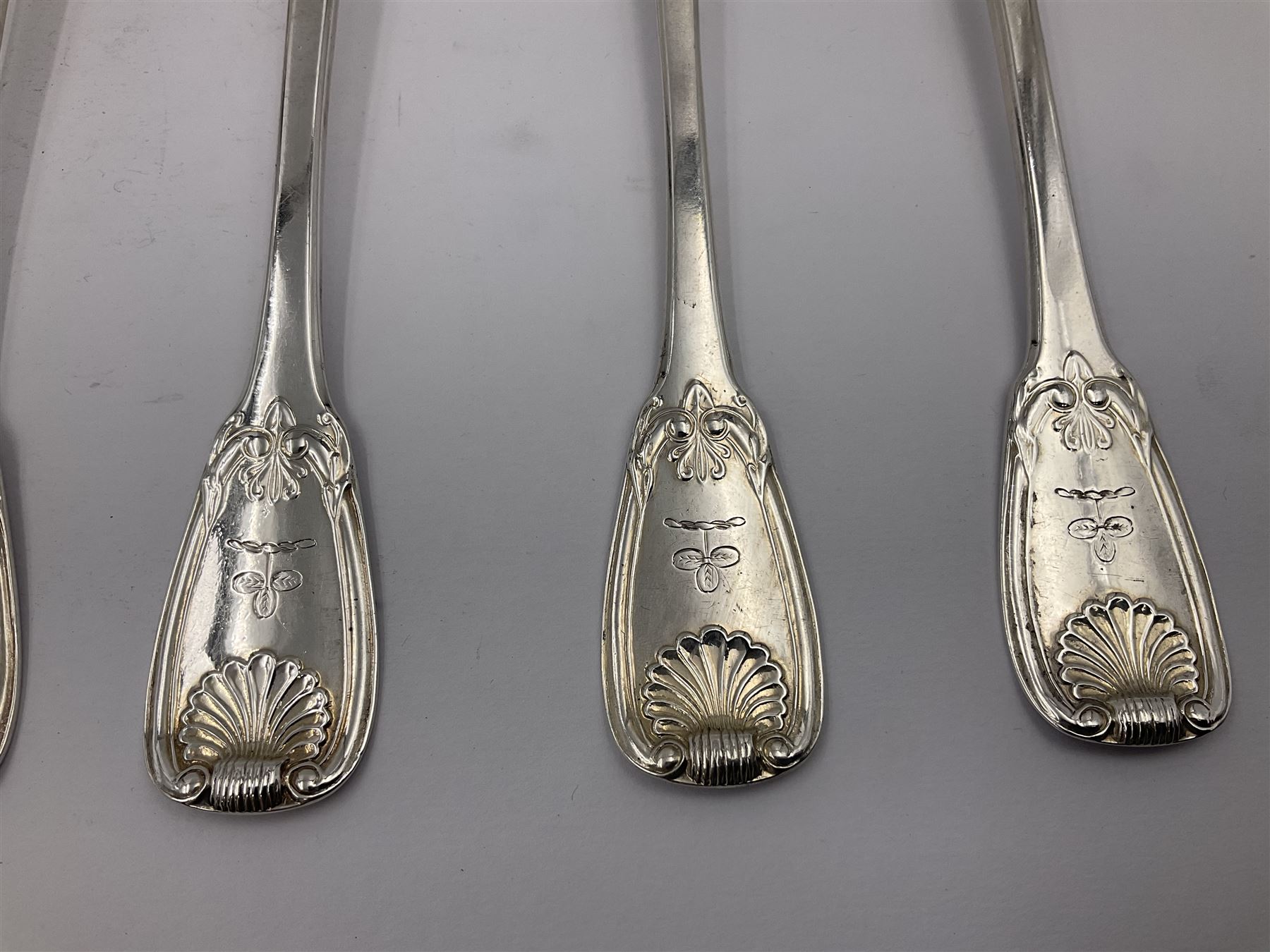 George IV Scottish silver Kings pattern cutlery for six place settings, to include table spoons, table forks, dessert spoons and dessert forks, all engraved with shamrock crest to terminal, hallmarked Robert Gray & Son, Glasgow 1833