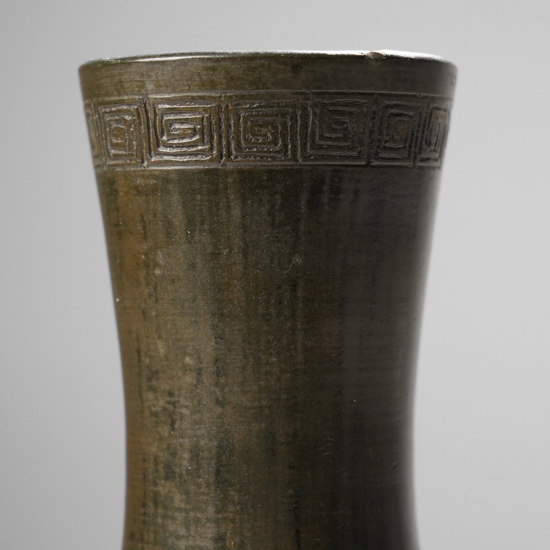 Chinese bronze vase, the cartouches containing Arabic characters on a granulated ground, unmarked H19cm