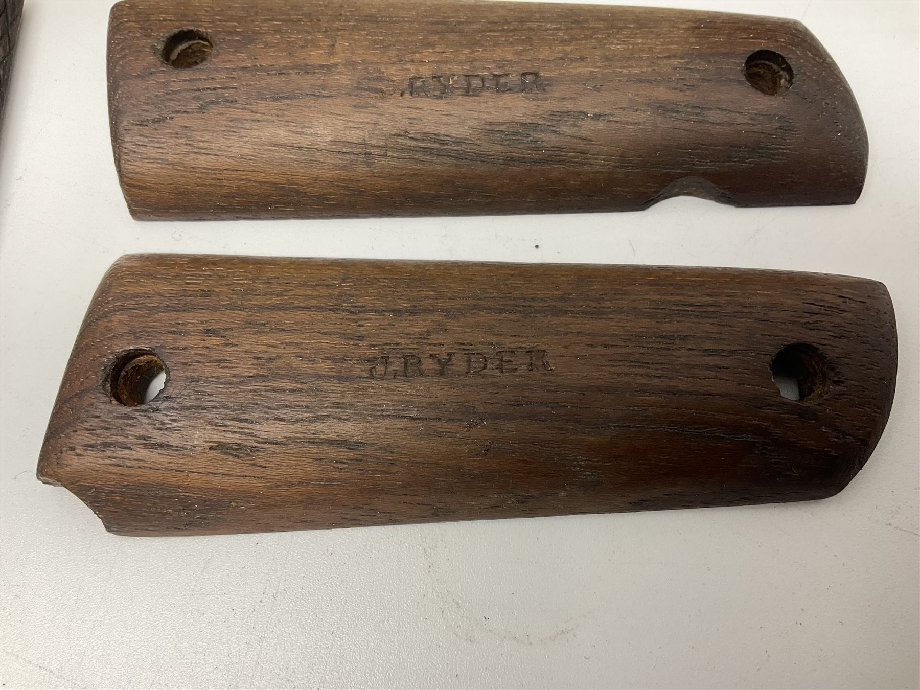 Six pairs of revolver grips;  pair of Lightwood & Son Ltd powder/shot measures in original box; and boxed Colt hammer shroud 