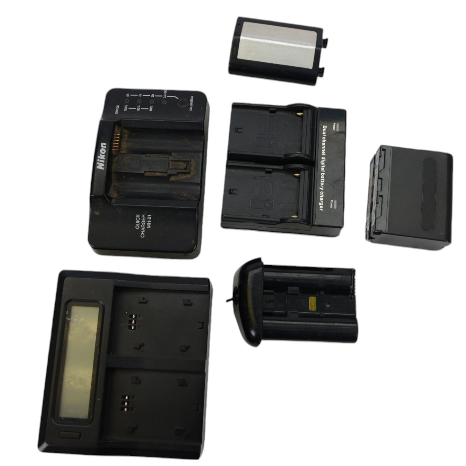 Nikon D2x digital SLR camera body, serial no. 5020627, with some associated battery packs and accessories