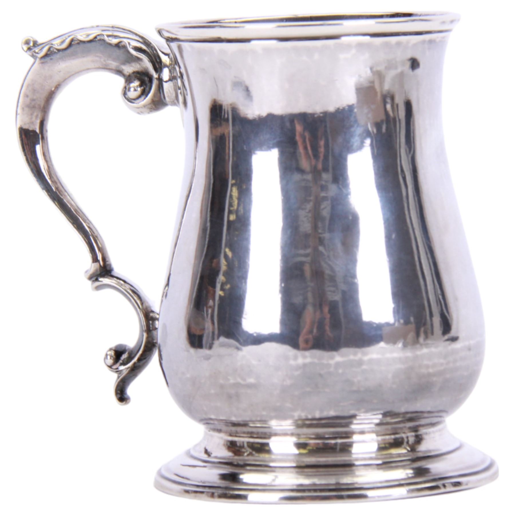 George III silver mug, of bellied form with acanthus capped scroll handle, upon a circular stepped foot, hallmarked Fuller White, London 1764, H12cm