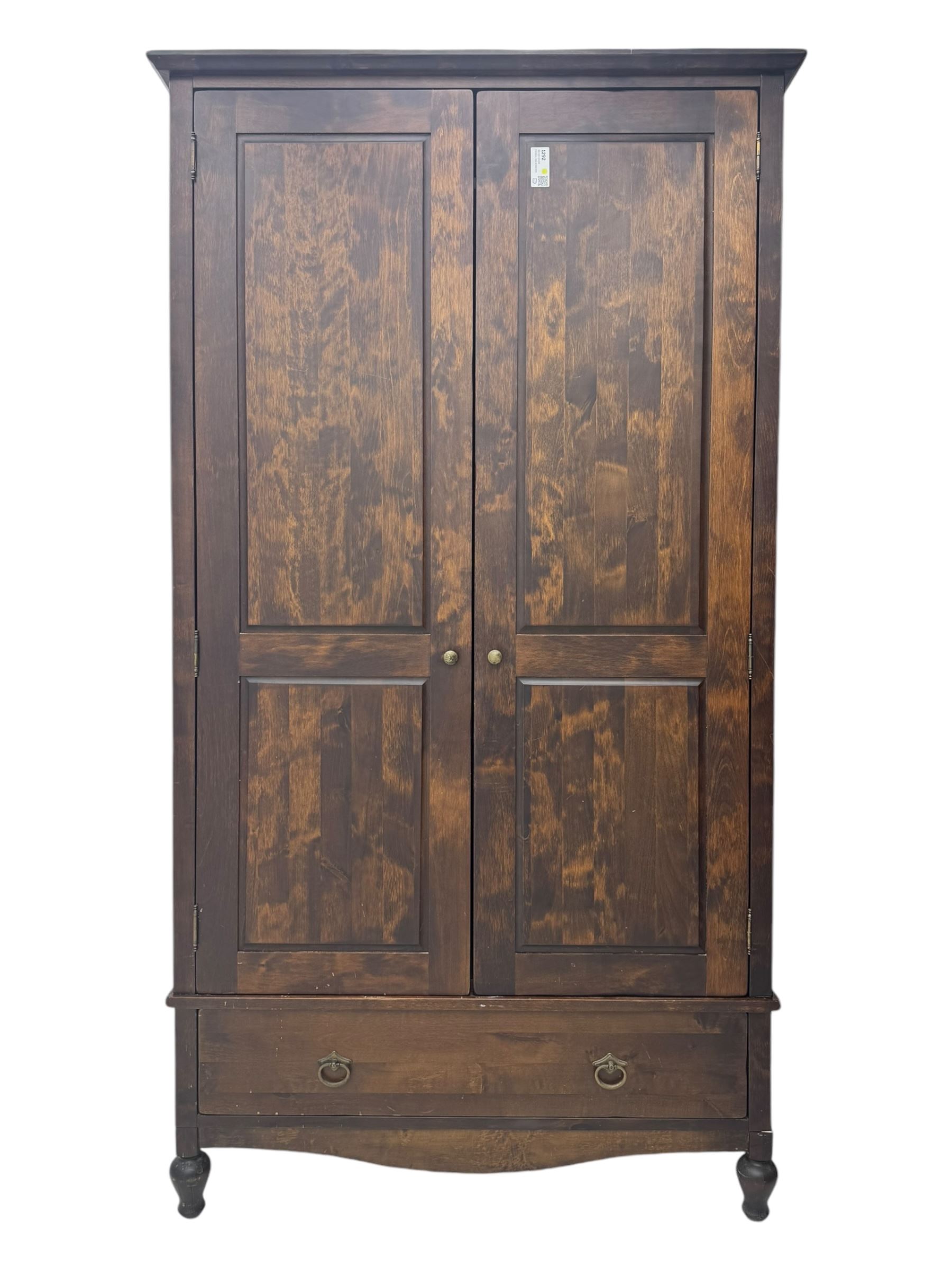 Marks & Spencer - dark wood double wardrobe, fitted with single drawer, on turned feet