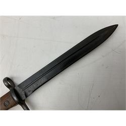 Swiss Model 1957 SIG rifle bayonet by Wenger with 23.5cm steel blade numbered 350857; in plastic scabbard with leather frog stamped GSCH 85 L38cm overall; and Egyptian Hakim rifle bayonet with the same script number to the grip and steel scabbard (2)