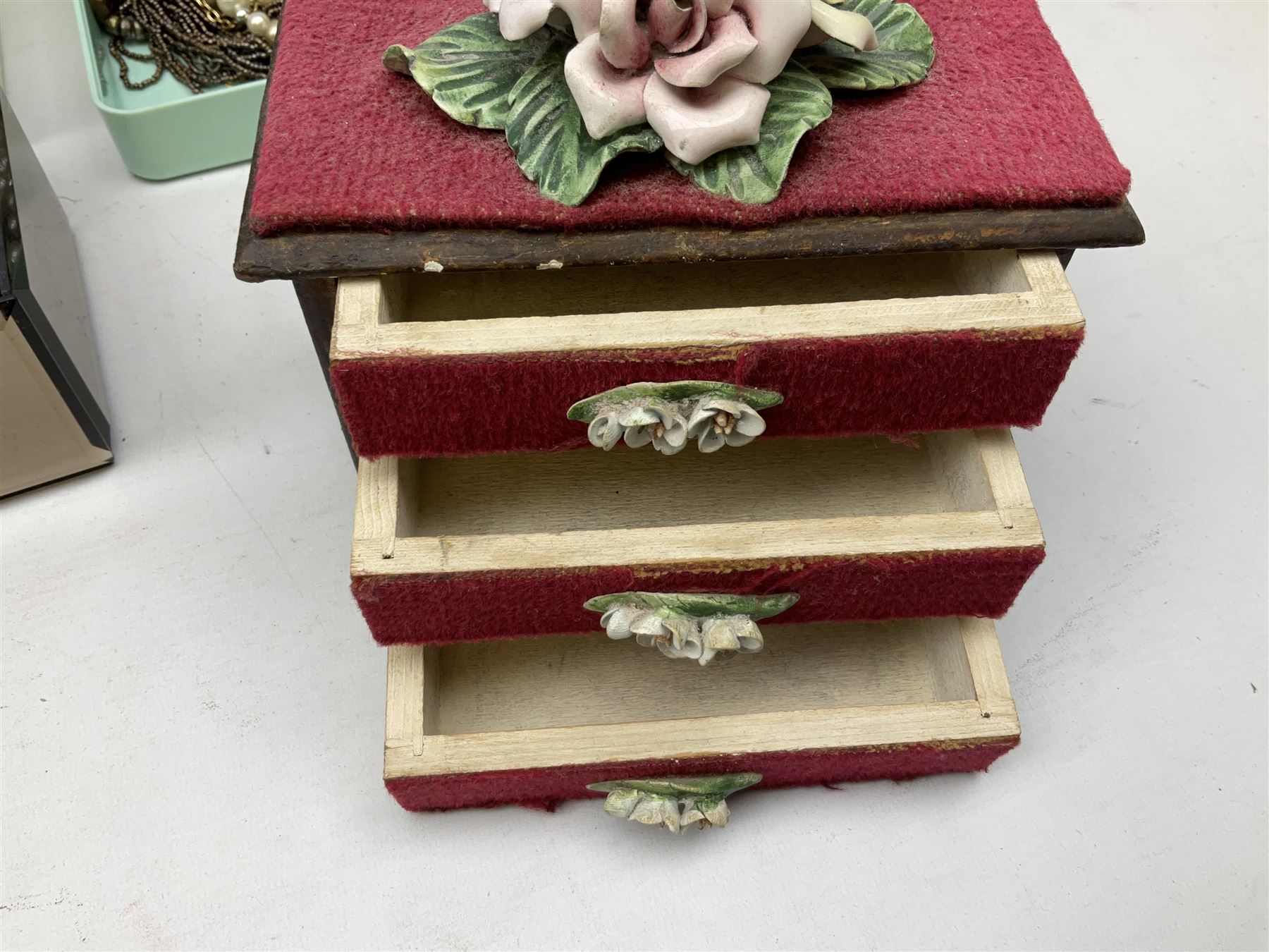 Collection of costume jewellery including enamel and marcasite flower brooch, two V Villani Italy bangles, clip on earrings, brooches, bangles, beaded necklaces and a Skagen wristwatch