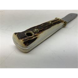 German Puma Hunter's-Pal knife, the 10cm steel blade marked model 6397, serial No.72573 to guard, fixed blade, antler scales; in original hard plastic case with paperwork and guarantee label; with brown leather sheath marked Puma L22.5cm overall