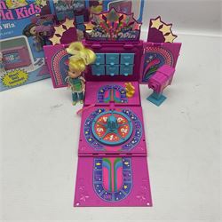 Wish World Kids - Eleven play sets comprising Treats ‘n Sweets Refrigerator, Grin ‘n Win TV, Sponge ‘n Plunge Bathtub, Socks ‘n Locks Dresser, Spice ‘n Slice Stove, Sleep ‘n Leap Bed, File ‘n Smile Desk, Blaze ‘n Braise Fireplace, Hear ‘n Cheer playset in Sponge ‘n Plunge box, two Read ‘n Speed Chair playsets in one box