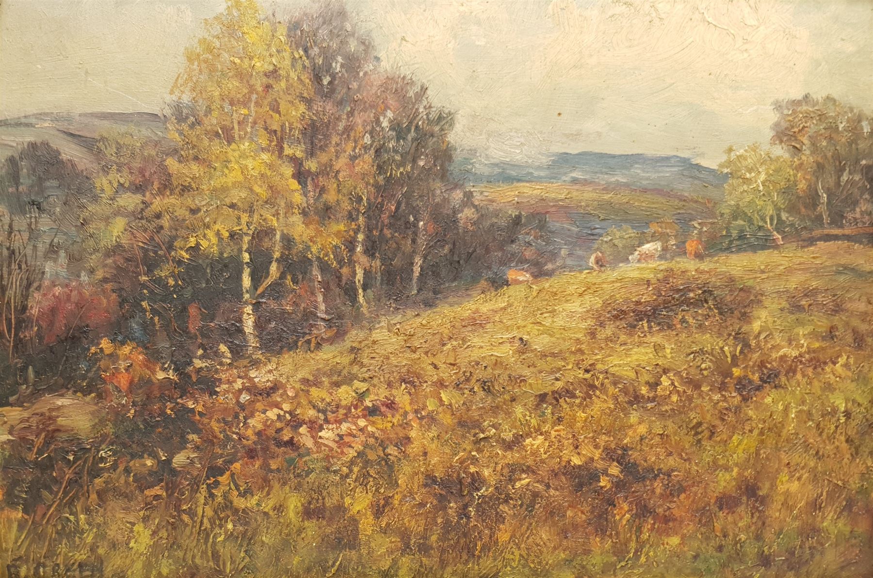 Reginald Green (British 1884-1971): Cattle Grazing on a Wooded Hillside, oil on board signed 22cm x 32cm
