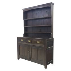 Georgian design oak dresser and rack, fitted with three drawers and two cupboards, complete with three tier plate rack