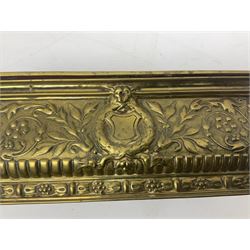 Collection of victorian and later brass desk accessories, to include a letter holder with cherub design, ink well of square form with hinged lid, brass table bell, brass casket with relief decoration, etc  