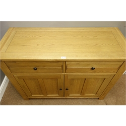  Willis & Gambier Solid light oak sideboard fitted with two drawers above two panel doors, W121cm, H88cm, D49cm  