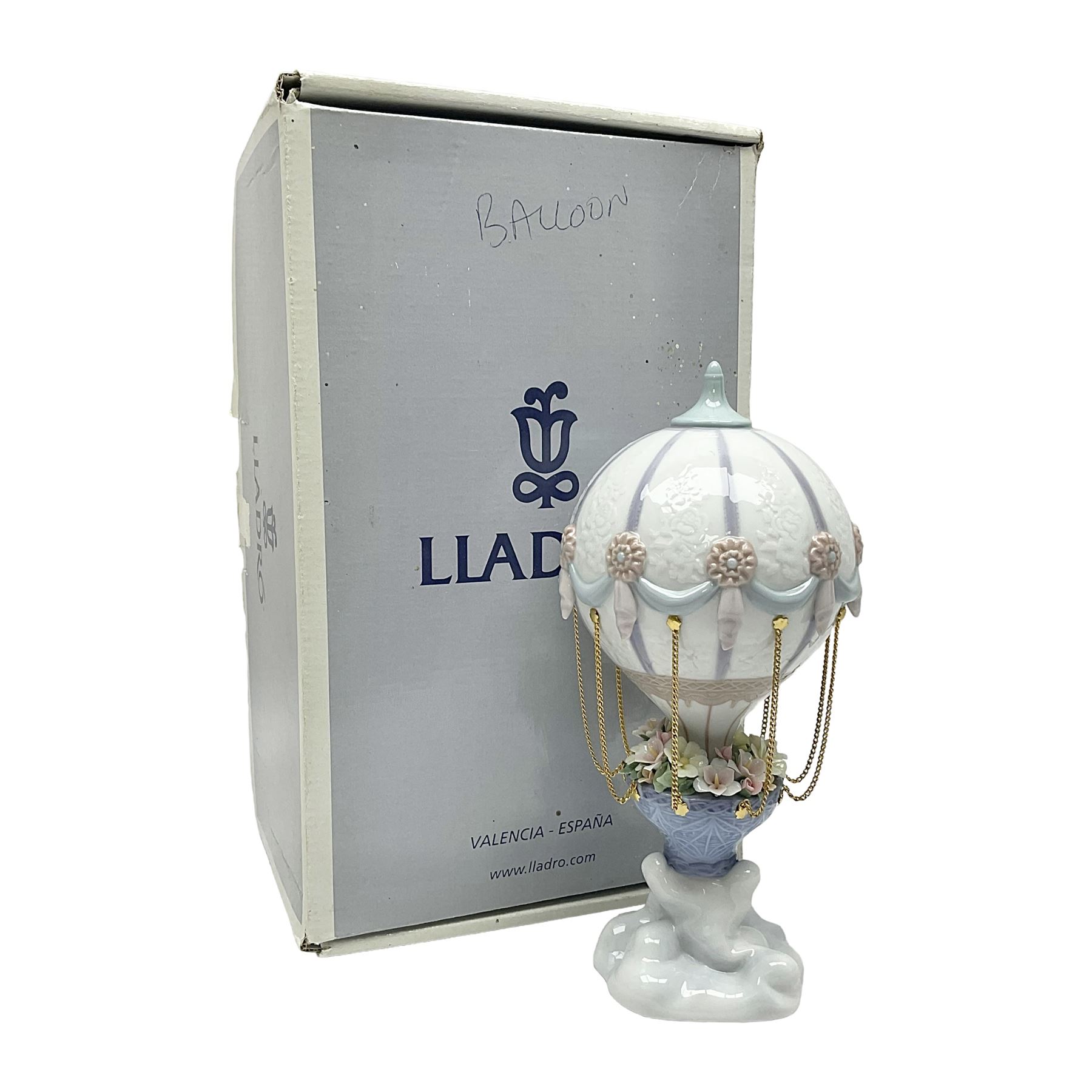 Lladro Flying High, modelled as a hot air balloon, with brass chains to suspended blossom filled basket, no 6523, with original box, H23cm
