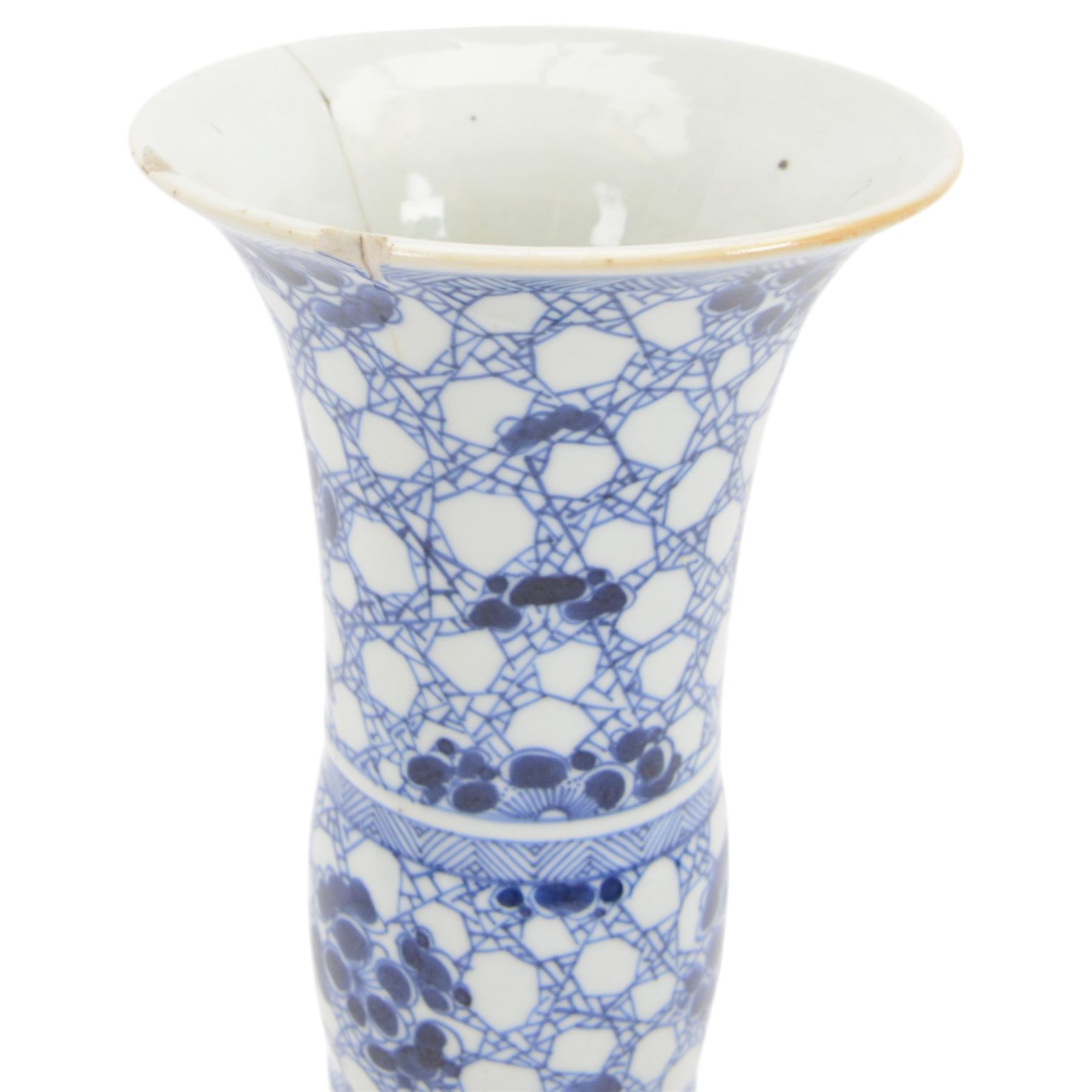 Chinese blue and white vase of cylindrical form, decorated with dragons amongst foliage, together with two other vases 