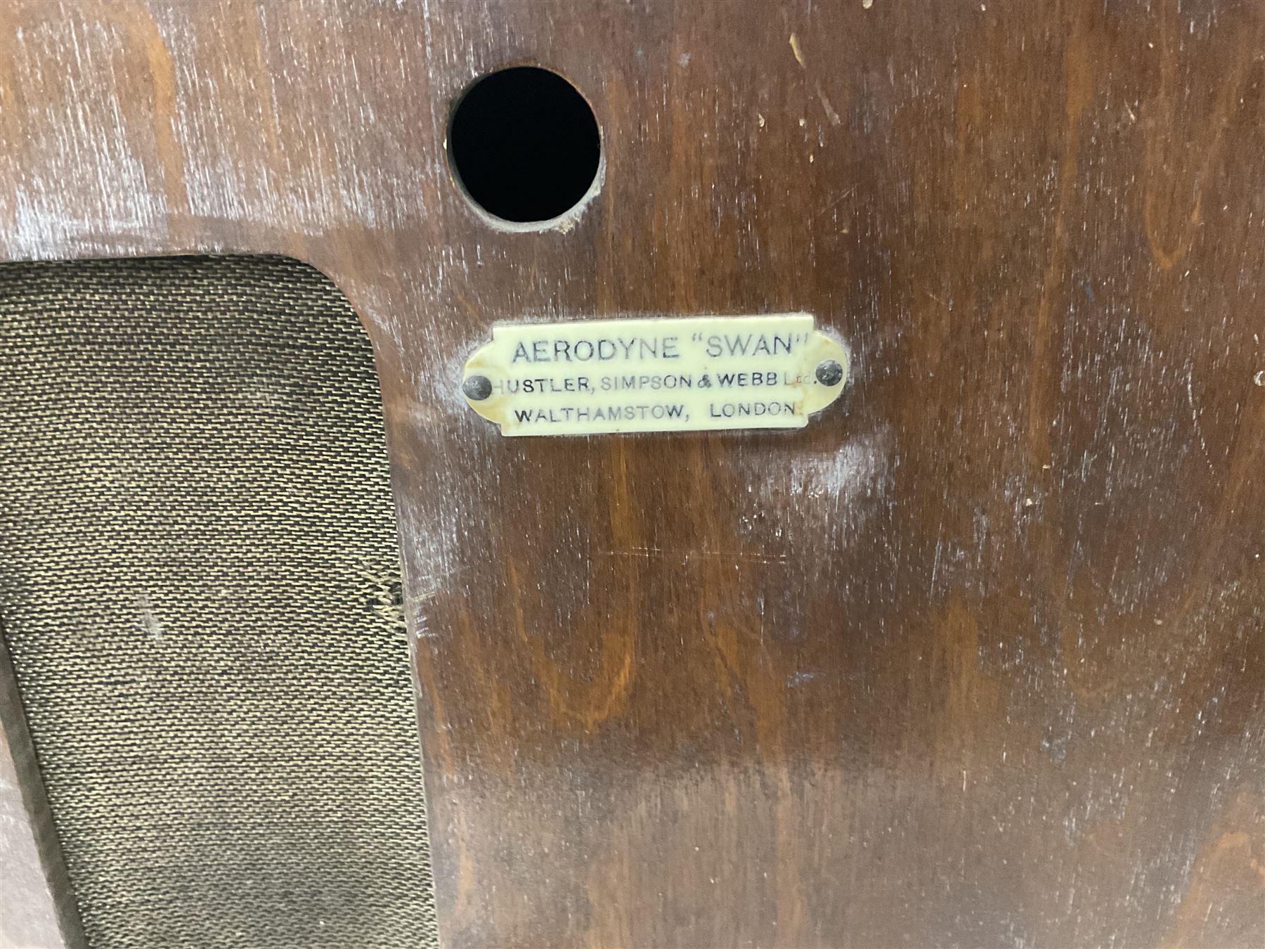 Two 1930s radios, comprising Art Deco Lotus valve example with copper fixtures, H50cm W37cm  together with a Swan Aerodyne example decorated with inlay