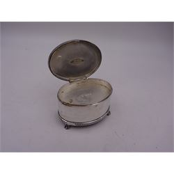 Modern silver limited edition music box, of oval form, with applied parcel gilt scene of sailing ships to centre of hinged cover, upon four claw feet, with musical mechanism within, no. 94/500, H4.3cm