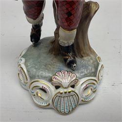 Royal Crown Derby figurine, Winter, modelled as a man with crossed arms on ice skates, by M. Townsend, with printed marks beneath, H24cm