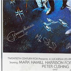 Limited edition multi-signed one sheet Star Wars poster, signed by Kenny Baker, Jerome Blake, Phil Brown, Jeremy Bulloch, Silas Carson, Mike Carter, Michaela Cottrell, Oliver Ford Davies, Mike Edmonds, Garrick Hagan and Michael Sheard, with certificate of authenticity form Collector Zone, framed, poster H90cm, W62cm