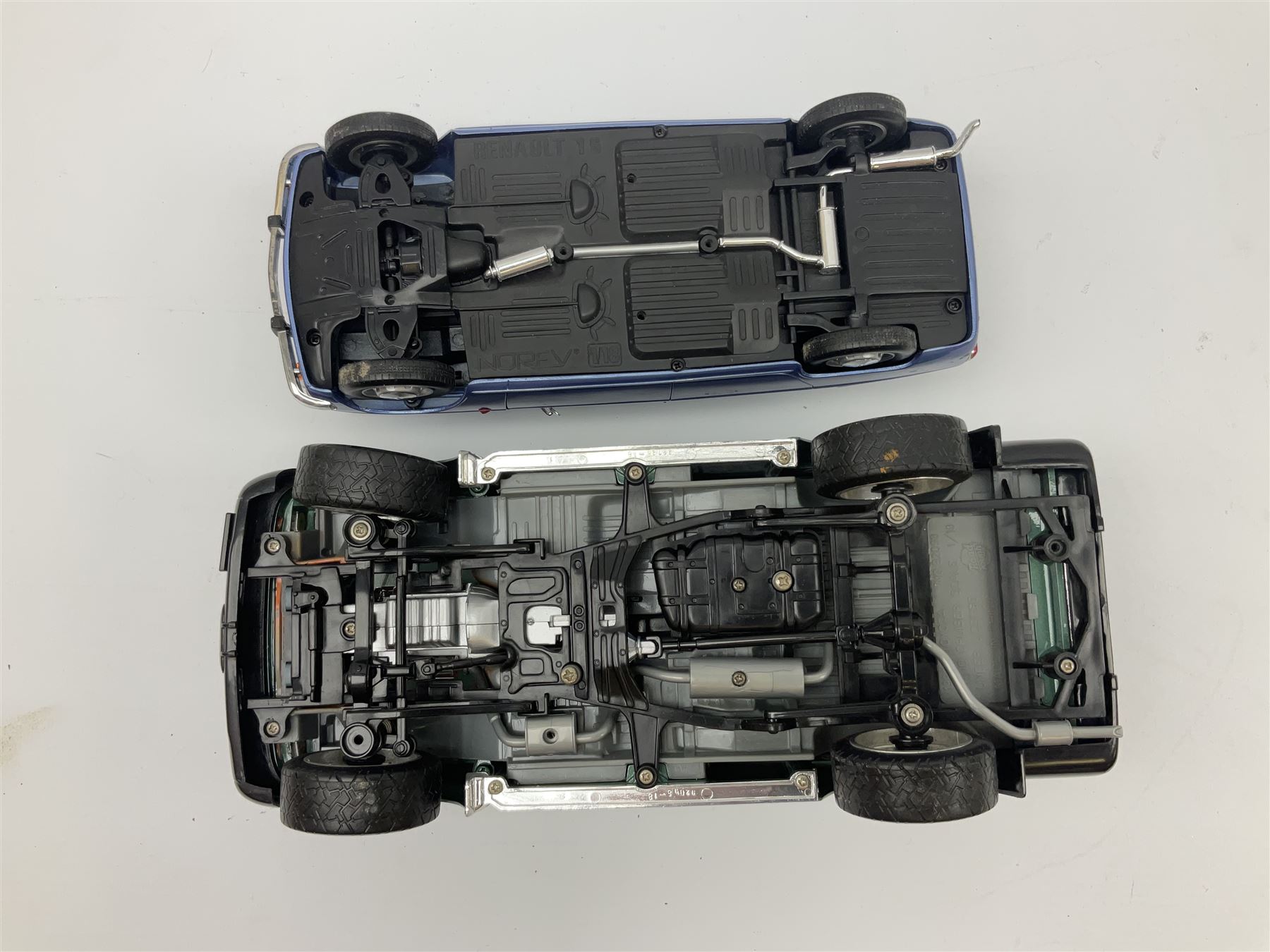 Nine 1:18 scale die-cast models including Ertl Chevrolet; Norev Renault 16; Sun Star Mitsubishi Pajero and Lotus Elan; Motor Max Land Rover Discovery; Road Tough Mercedes Benz 500SL etc; all unboxed (9)