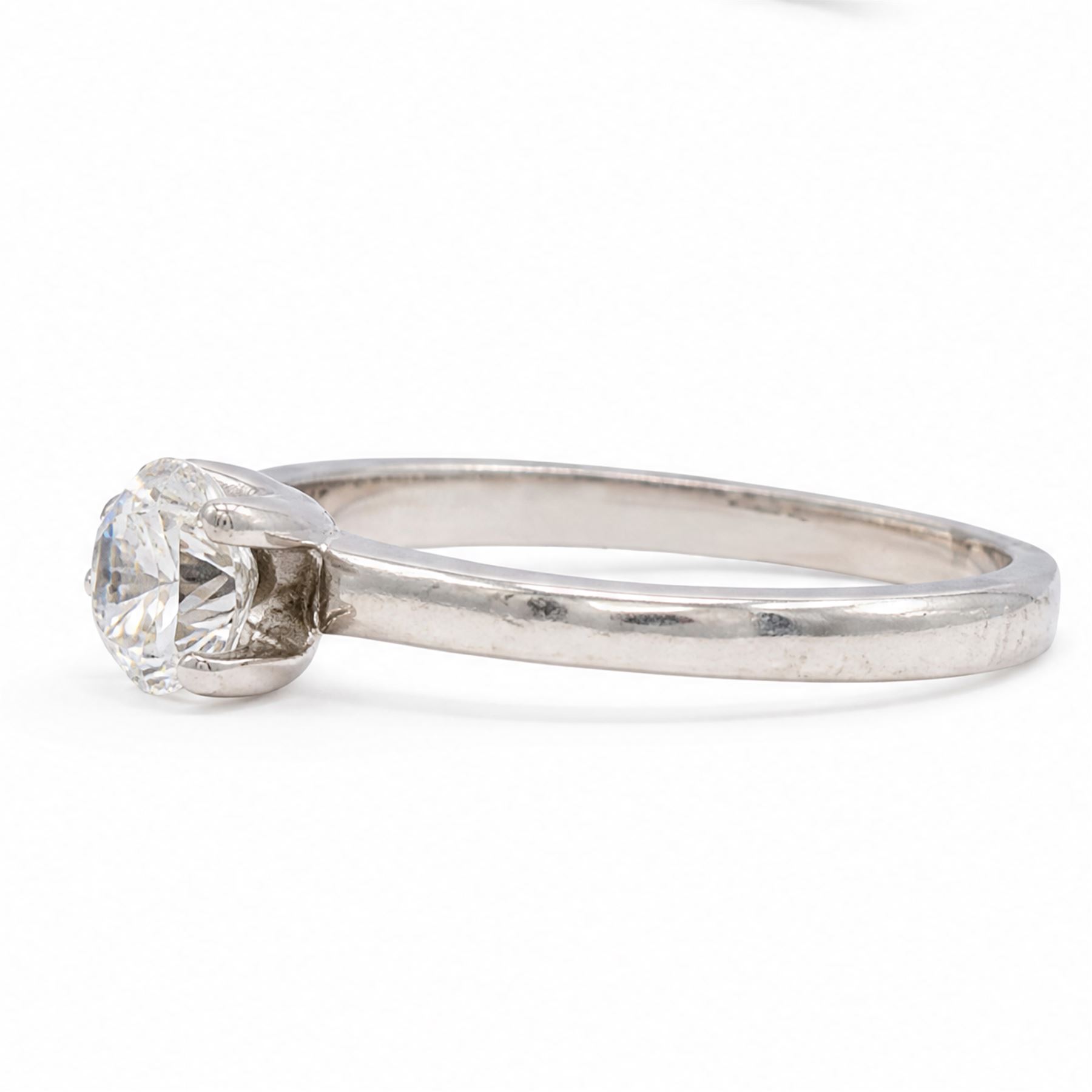 Platinum single stone diamond crossover ring, single round brilliant cut diamond of 0.50 carat, hallmarked