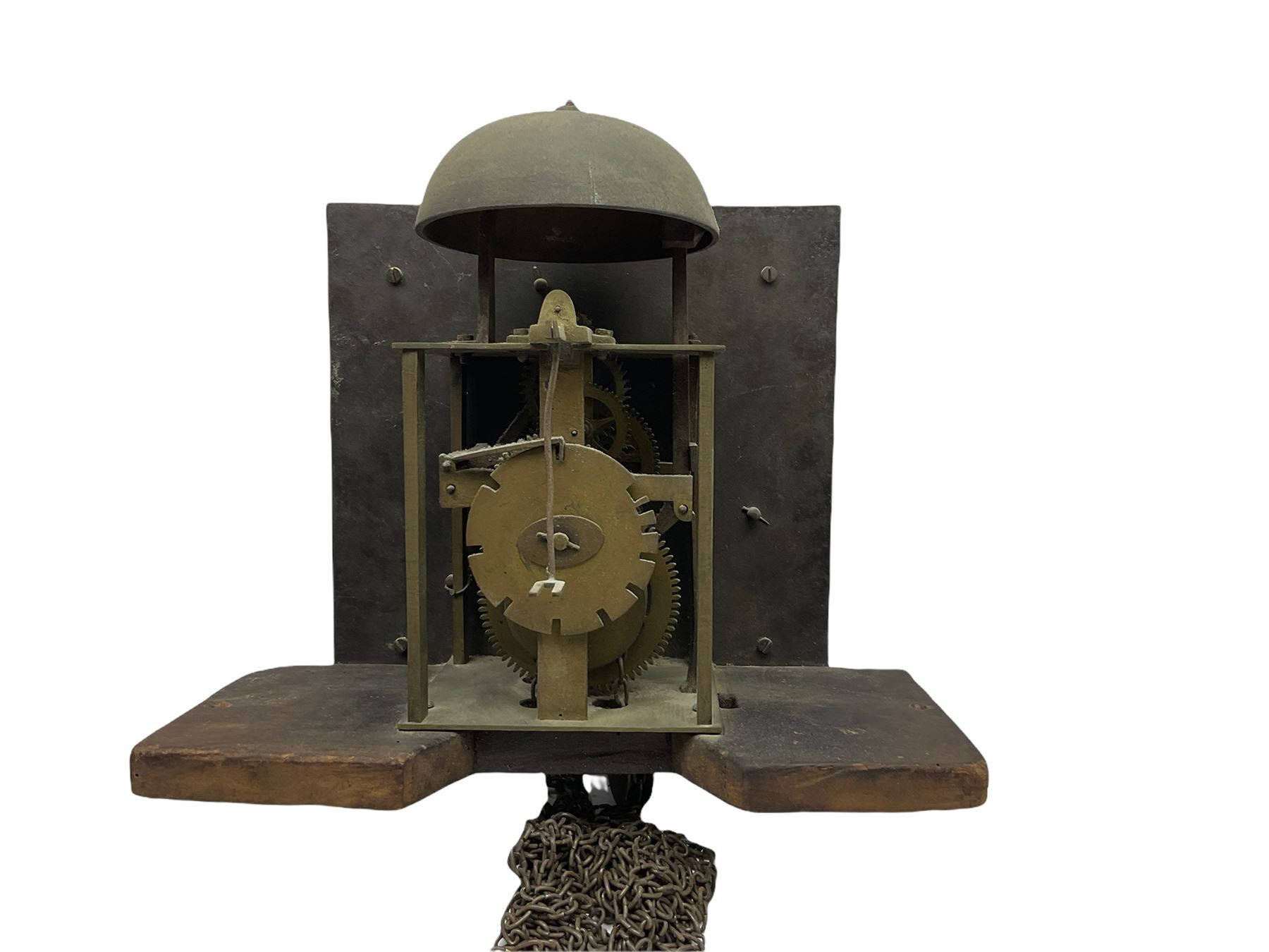 A mid-18th century 30-hour provincial longcase clock by John Darke of Holdsworthy (Devon), in an oak case with a flat-topped pediment, square hood door flanked by two free standing pillars with brass capitals, trunk with a flat-topped full-length door on a rectangular plinth with applied shaped skirting, a 9-1/2” square brass dial with a matted centre and brass (unsilvered) chapter ring, engraved with roman numerals, half and quarter hour divisions, single steel hand and 