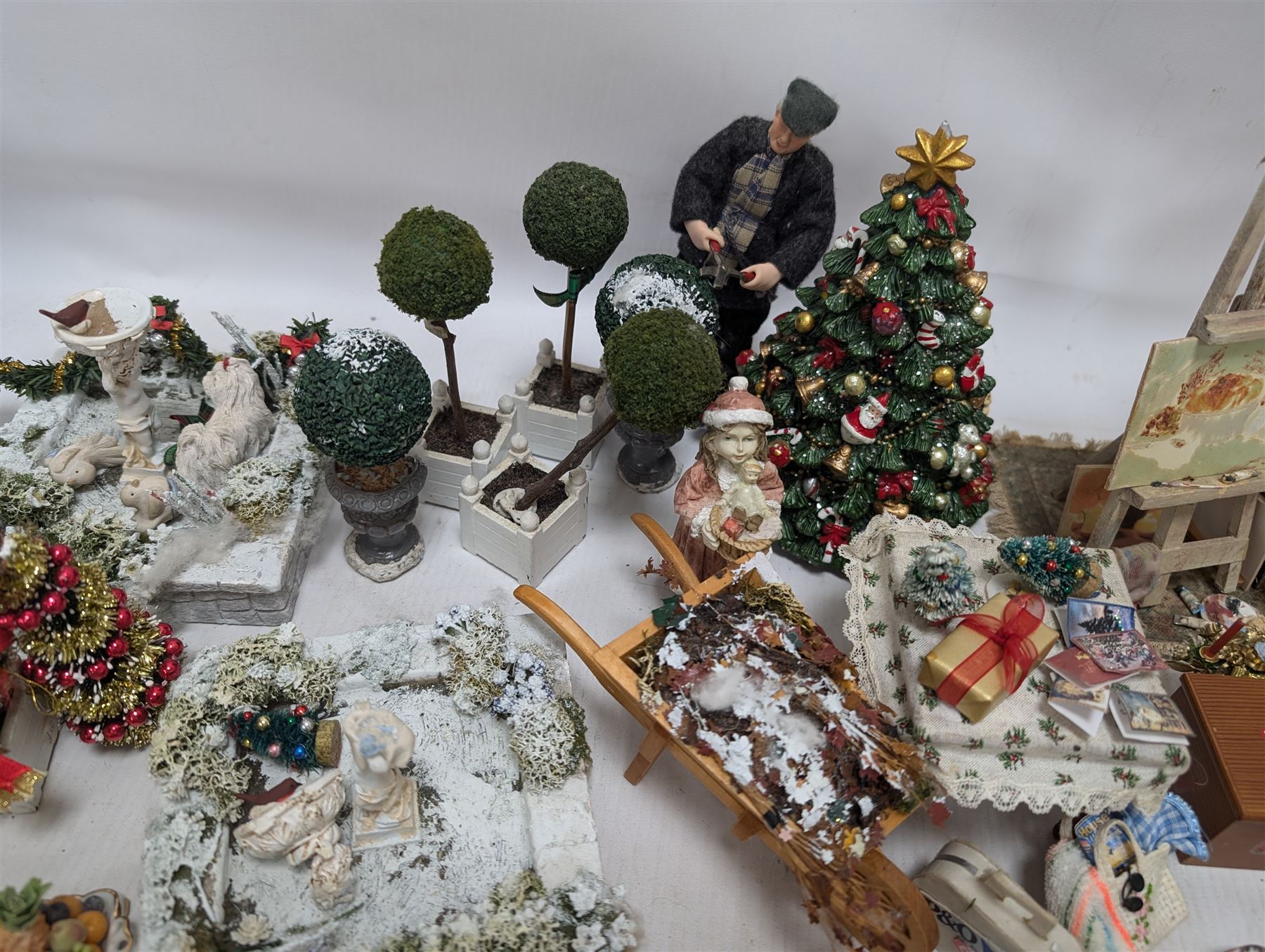 Dolls house conservatory and garden accessories, including sofa and chairs, trees, plants, paintings, Christmas decorations, etc 