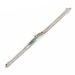 14ct white gold diamond and emerald crossover bracelet, the central section set with five graduating round brilliant cut diamonds and five emeralds, to a chevron link bracelet, stamped 585, total diamond weight 0.35 carat