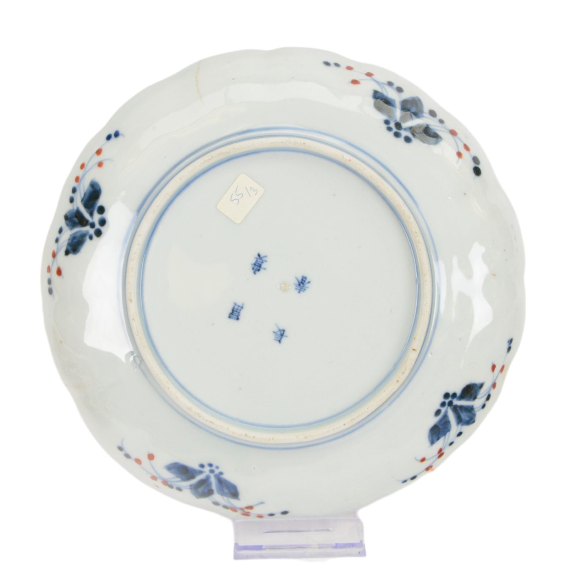 Group of 19th century Japanese Imari porcelain, Meiji period, comprising pair of lobed dishes, decorated stylised reserves and painels in blue and gilt upon a red ground, H6.5cm D21.5cm, a pair of plates of circular lobed form, decorated with a central panel depicting a vase beneath pine branches, and surrounded by panels of flowers and stylised quatrefoil shapes, D21cm, and another similar example painted with a character in underglaze blue to the centre, with character mark beneath, D22cm, each with character marks beneath               