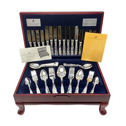 Viners Emassy canteen of Sheffield silver plated cutlery, 58 pieces, comprising eight table knives, dessert knives, dessert spoons, teaspoons, table forks, dessert forks, soup spoons, and two table spoons, housed in case with hinged lift up lid raised on four feet, L45cm