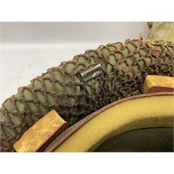 1970s British turtle style steel helmet with liner, green cover and netting; liner marked C.W.L. 1972 No.8415-99-973-6750; size 6 3/4 - 6 7/8; WWII respirator dated 1941 in canvas carrying case; and a Native long-shafted spear with iron head and bound plain round haft L165cm (3)