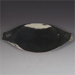 1920s silver paten, of oval form and handles with pierced cross decoration, engraved to underside 'Ex Dono Adae Moss Hill', hallmarked Blunt & Wray Ltd, London 1929, handle to handle W25cm