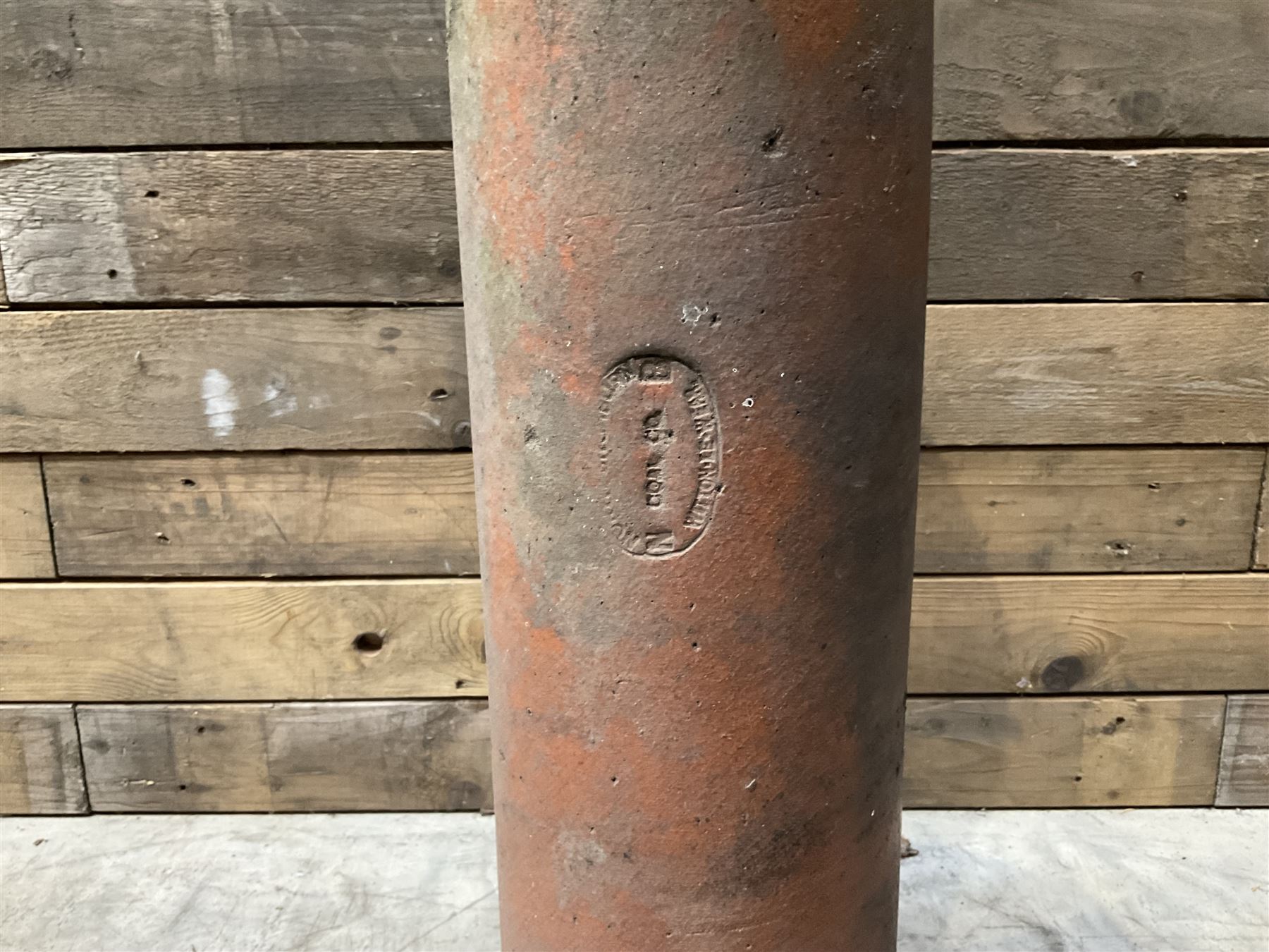 3 cauldron set pots with 2 terracotta chimney pots, 1 terracotta crock, metal bucket and small cast iron shelf 