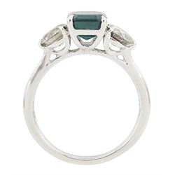 Platinum tourmaline and diamond three stone ring, single octagonal cut green tourmaline of approx 1.65 carat, with a round brilliant cut diamond set either side, stamped PT 950, total diamond weight approx 1.05 carat