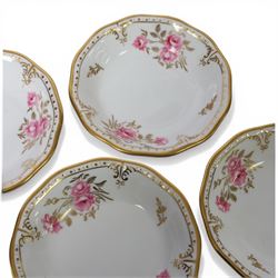 Modern Royal Crown Derby tea set for six place settings, decorated in the Royal Pinxton Roses pattern, comprising tea cups, saucers, small dishes, side plates, dessert plates, one serving plate, twin handled lidded sucrier and milk jug