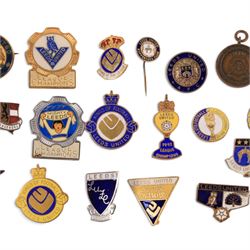 Collection of Leeds United enamel badges, including League Champions and League Winners examples, and a embroidered LUAFC patch