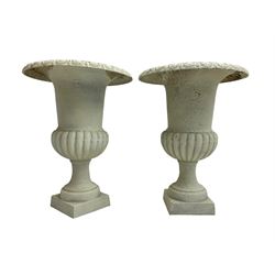 Pair of Victorian design white painted cast iron campana shaped garden urns, egg and dart rim over a gadrooned underbelly, tapering column on square plinth base - THIS LOT IS TO BE COLLECTED BY APPOINTMENT FROM DUGGLEBY STORAGE, GREAT HILL, EASTFIELD, SCARBOROUGH, YO11 3TX