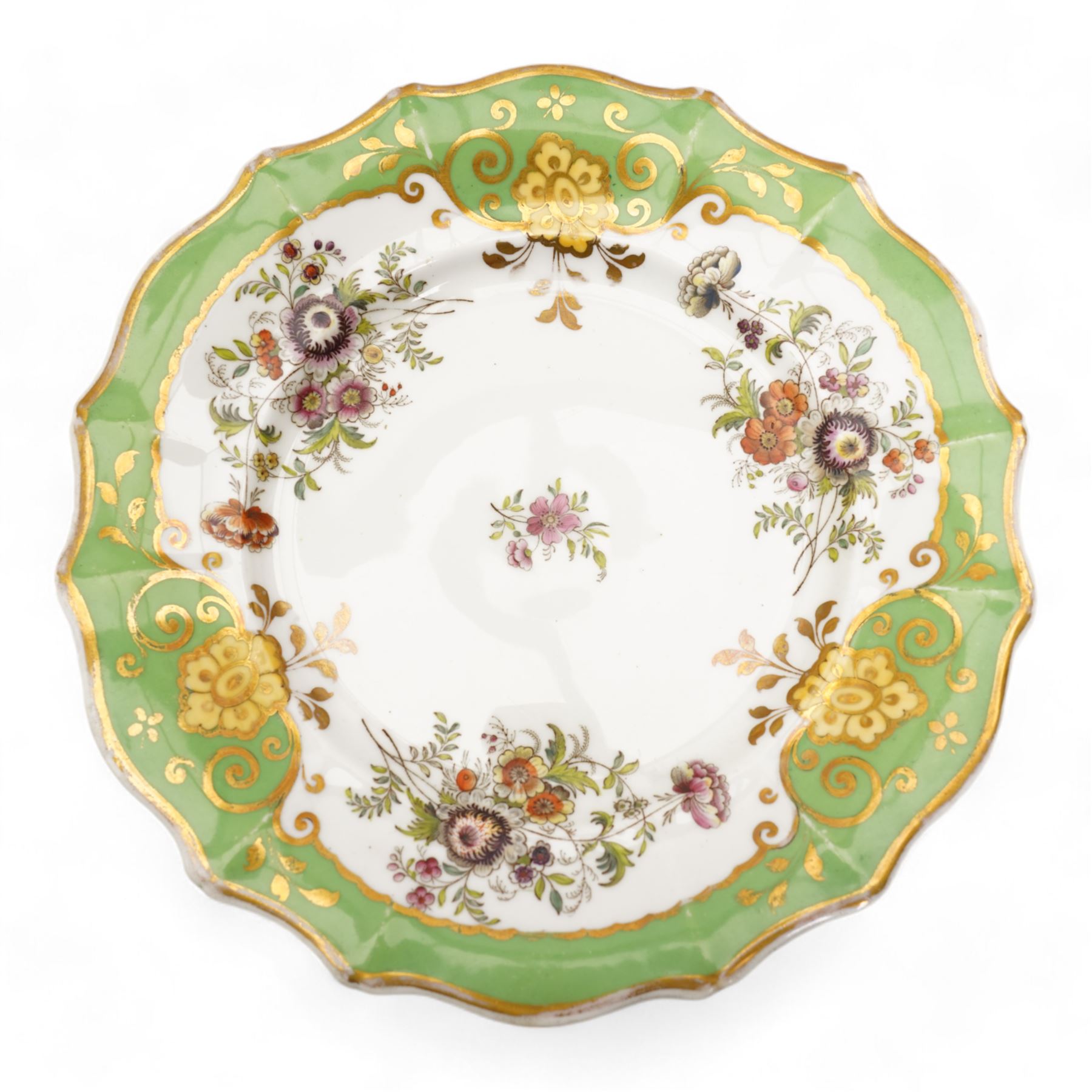 Large early 19th century Derby porcelain dessert basket, of rectangular twin-handled form, with cobalt blue and gilt decoration, painted marks beneath, L29cm together with a 19th century porcelain dessert service, decorated with floral sprays within a green and gilt border, comprising eight plates and three serving dishes, pattern no. 701/1