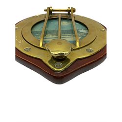 Reproduction ship's brass porthole, incorporating a photo of a boat behind glass, and mounted on a wooden back, D28cm